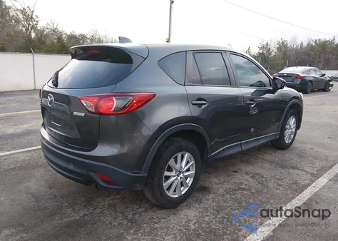 2014 Mazda Cx-5 Touring from USA, damaged, VIN JM3KE4CY6E0394802
